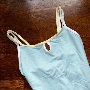 Light Blue Harmonie Bodywear Leotard with Keyhole Detail and Yellow/White Trim